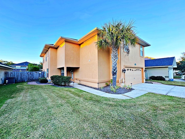 view of property exterior with a yard and a garage