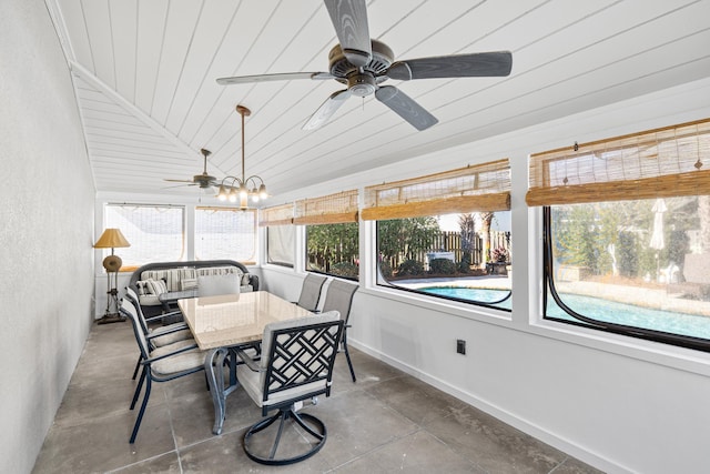 sunroom / solarium featuring lofted ceiling, ceiling fan, and wooden ceiling