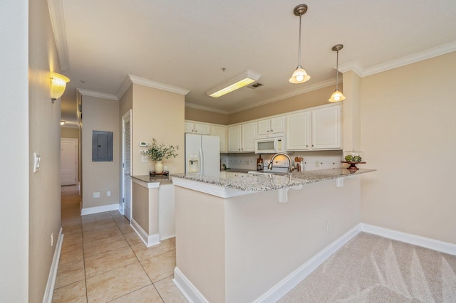 kitchen with kitchen peninsula, white appliances, decorative light fixtures, white cabinets, and electric panel