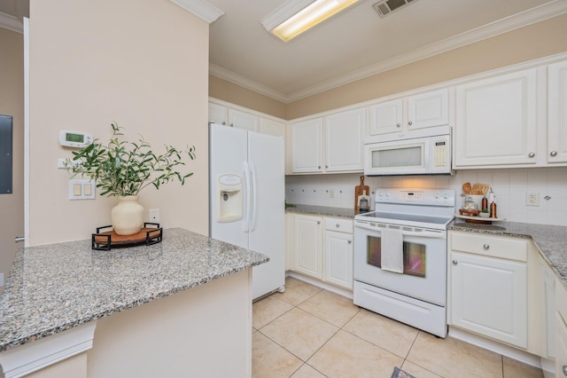 kitchen featuring tasteful backsplash, ornamental molding, white appliances, light tile patterned floors, and white cabinetry