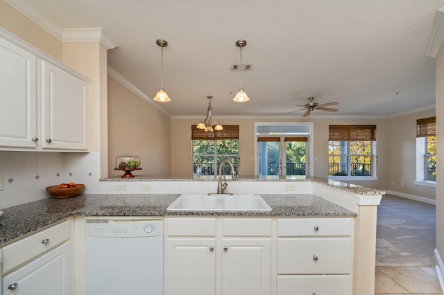 kitchen with dishwasher, kitchen peninsula, white cabinetry, and sink