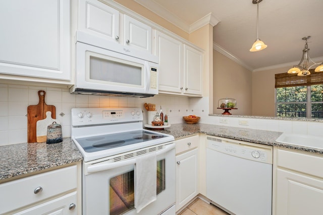 kitchen with white appliances, ornamental molding, decorative light fixtures, light tile patterned flooring, and white cabinetry