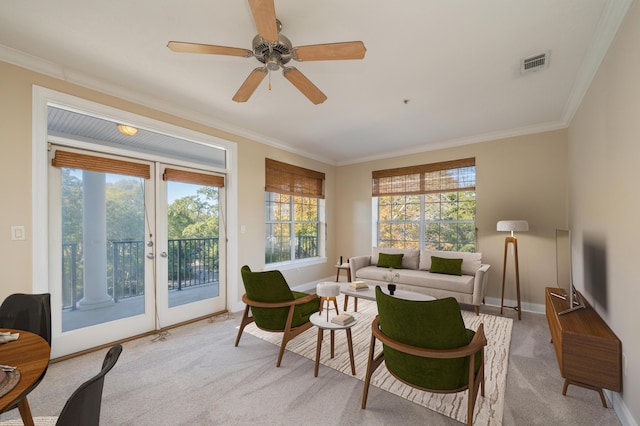 interior space with ornamental molding, a wealth of natural light, and french doors