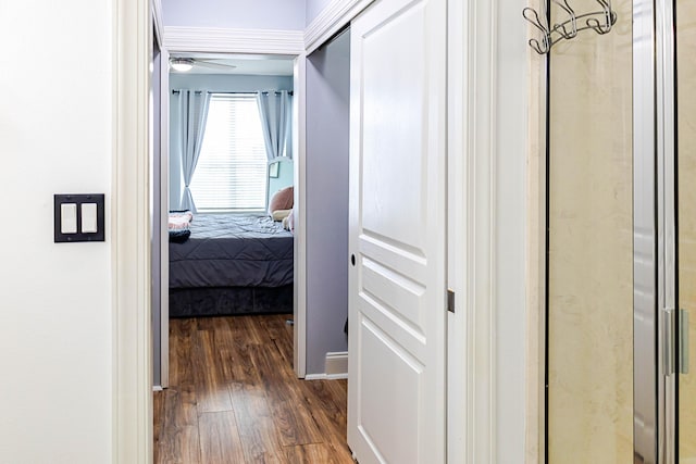 corridor with wood finished floors