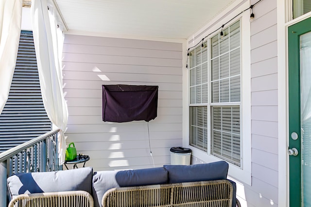 balcony featuring a porch