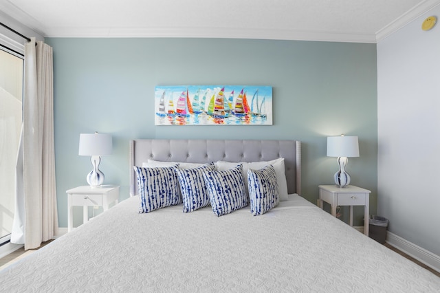 bedroom with ornamental molding