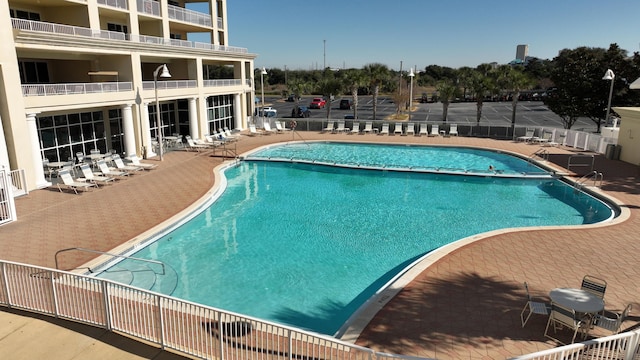 view of pool with a patio area