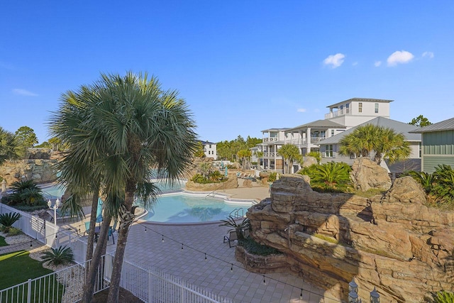 view of pool featuring a patio