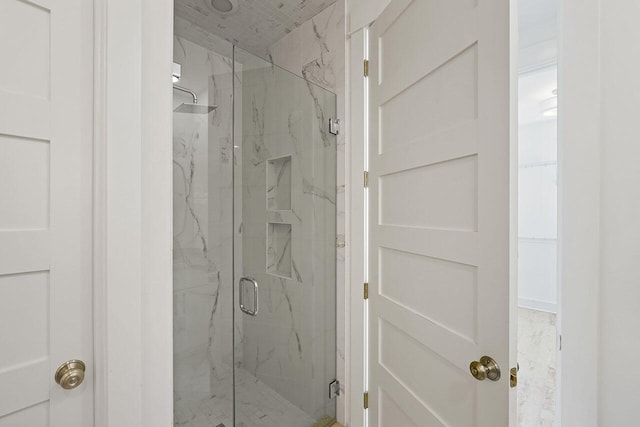 bathroom with an enclosed shower