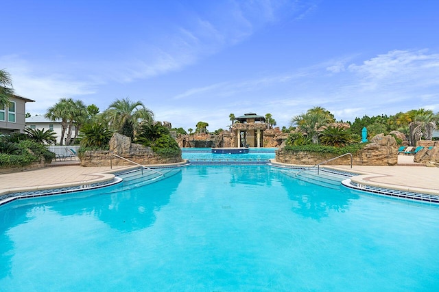 view of swimming pool featuring a patio area