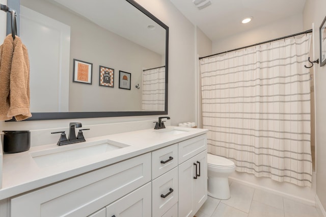 full bathroom featuring tile patterned flooring, vanity, shower / bath combination with curtain, and toilet