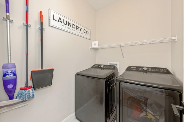 laundry room featuring independent washer and dryer