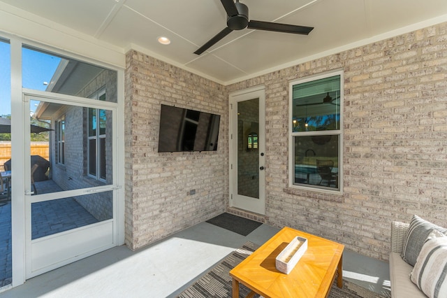 entrance to property with ceiling fan