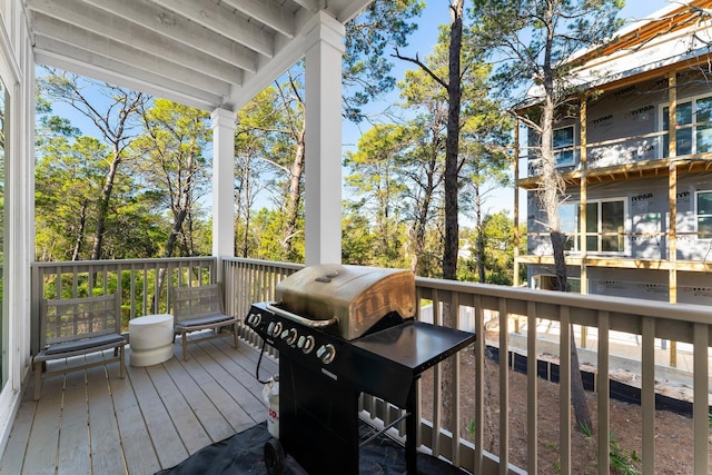 deck featuring a grill