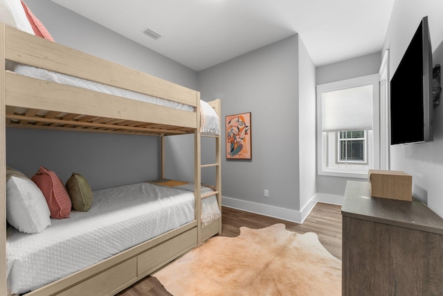 bedroom featuring hardwood / wood-style floors