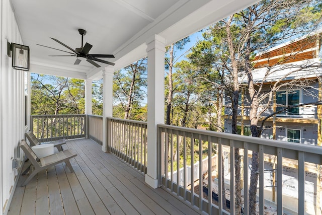 deck featuring ceiling fan and covered porch