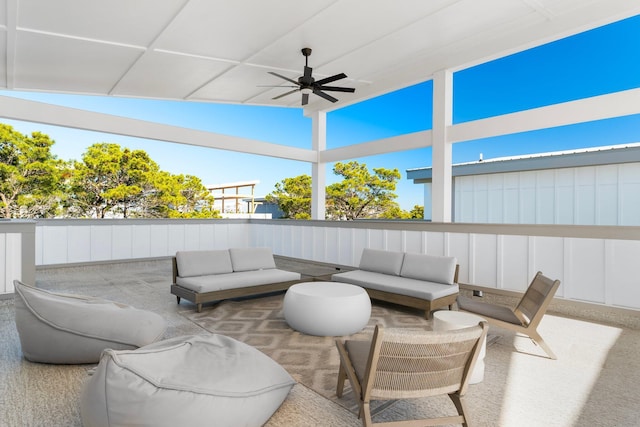 view of patio with ceiling fan and an outdoor hangout area