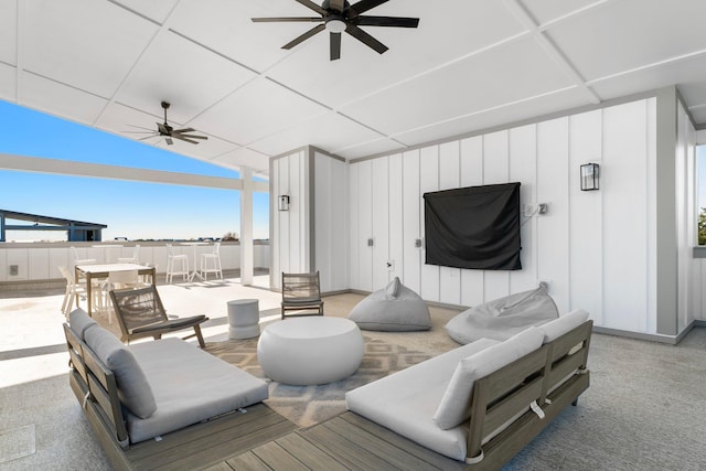 living room featuring ceiling fan