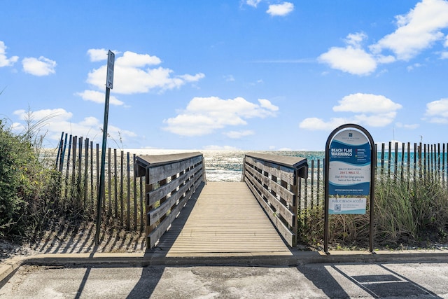 view of home's community featuring a water view