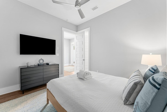 bedroom featuring hardwood / wood-style floors and ceiling fan