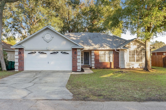 single story home featuring a garage and a front lawn