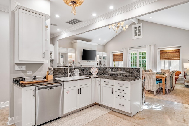 kitchen featuring white cabinets and dishwasher