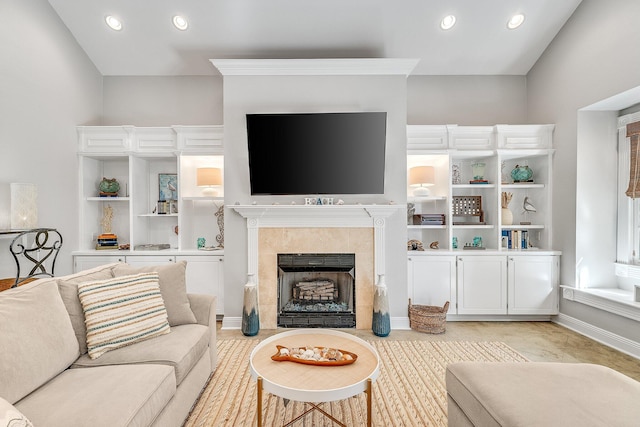 living room featuring a fireplace