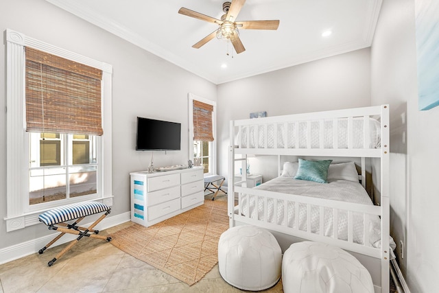 tiled bedroom with ceiling fan and crown molding