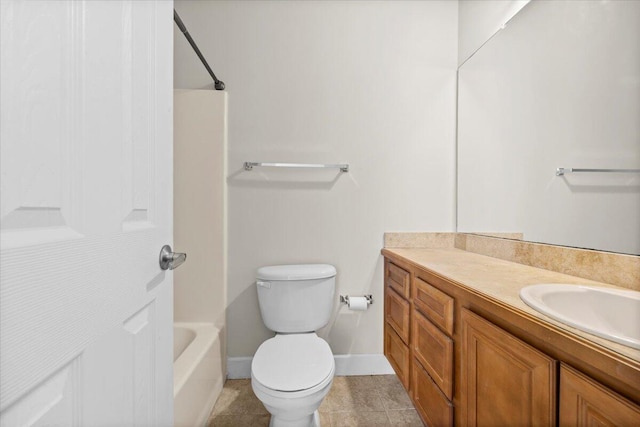 full bathroom with washtub / shower combination, vanity, toilet, and tile patterned flooring