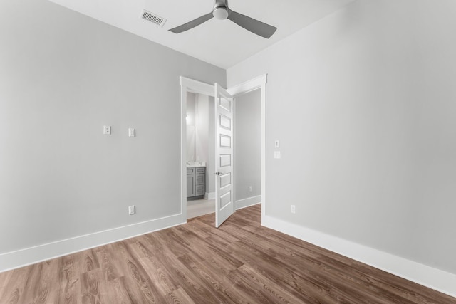 unfurnished bedroom with hardwood / wood-style flooring and ceiling fan