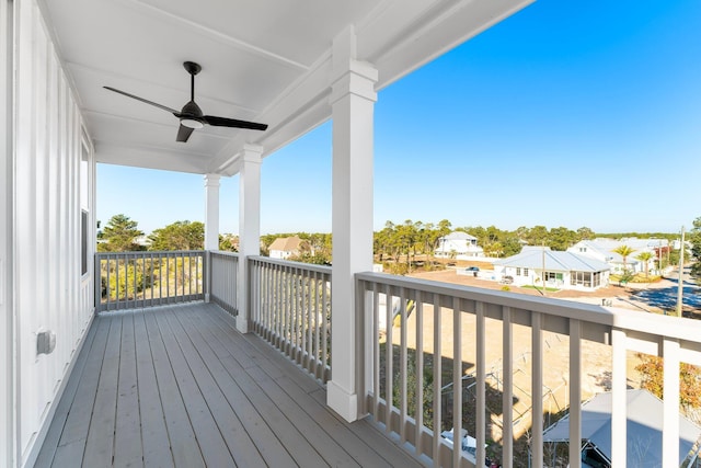 wooden deck with ceiling fan