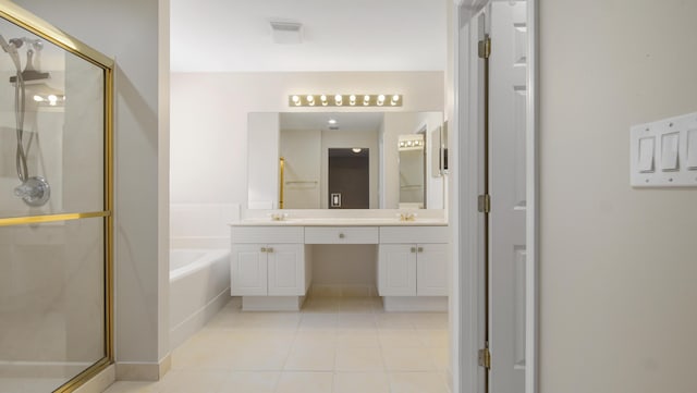 bathroom featuring tile patterned floors, vanity, and independent shower and bath