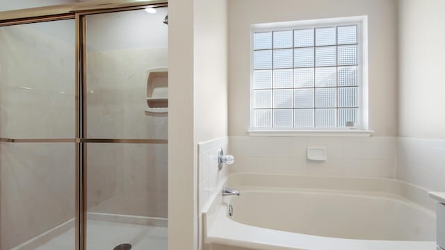 bathroom with independent shower and bath