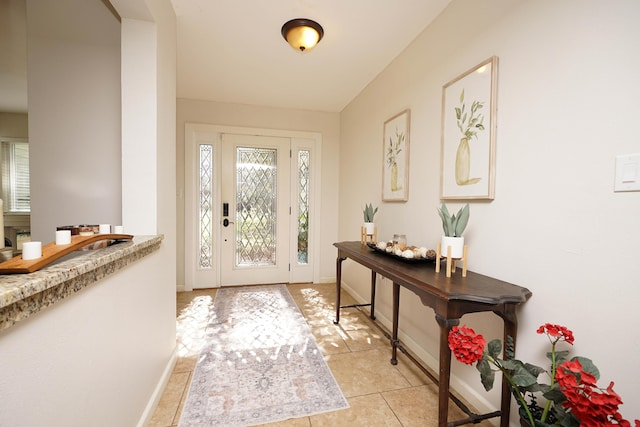 view of tiled foyer entrance