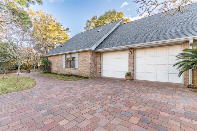 view of home's exterior with a garage