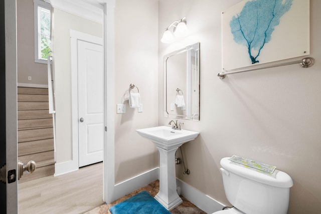 bathroom featuring toilet and sink