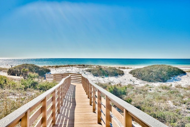 property view of water featuring a beach view