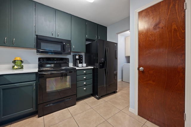 kitchen featuring light tile patterned floors and black appliances