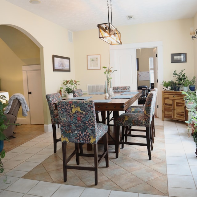 dining room with light tile patterned floors