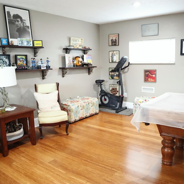 interior space with hardwood / wood-style flooring