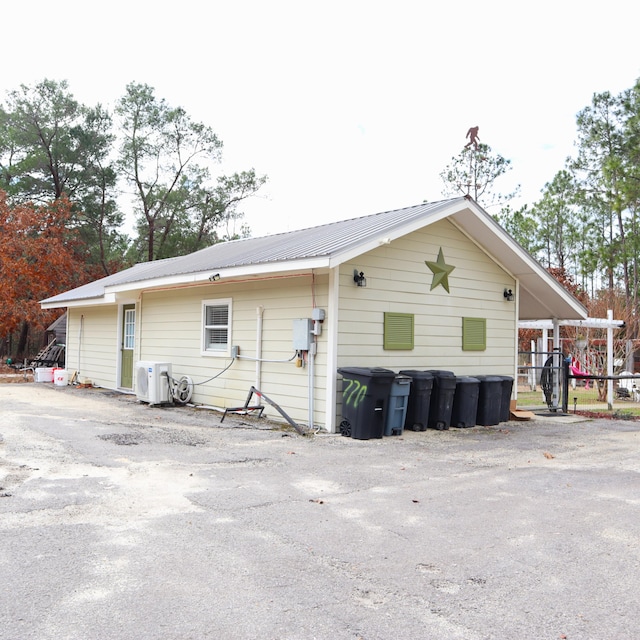 view of property exterior featuring ac unit