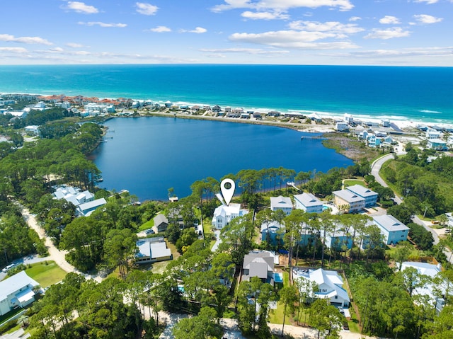 drone / aerial view with a water view