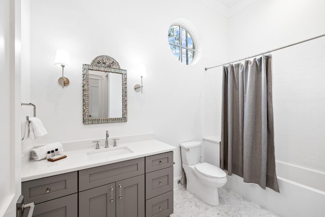 full bathroom featuring shower / bath combo, vanity, and toilet