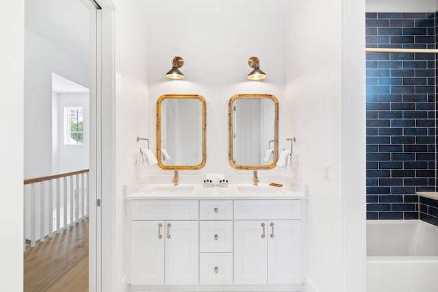 bathroom with vanity and  shower combination