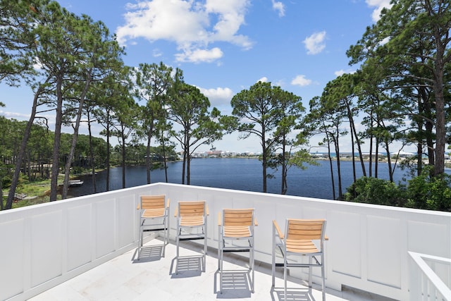 view of patio featuring a water view