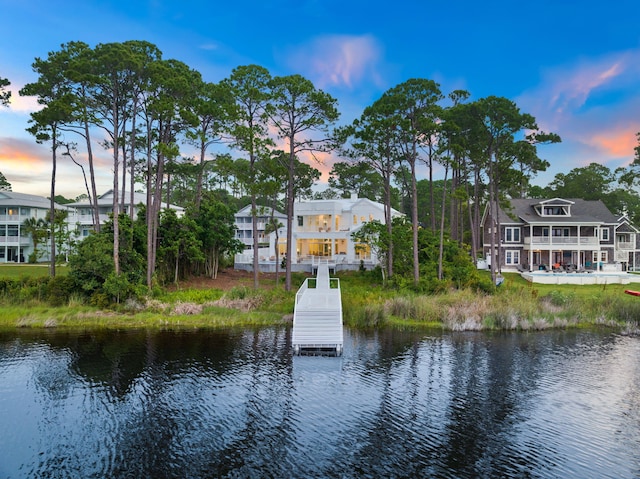 view of water feature with a dock