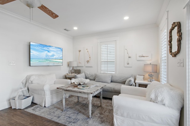 living room with ceiling fan, dark hardwood / wood-style flooring, and crown molding