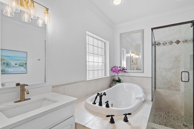 bathroom with vanity, ornamental molding, and independent shower and bath