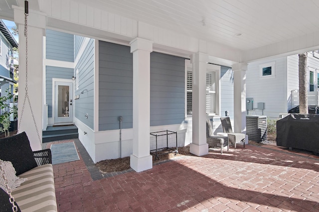 view of patio featuring a grill