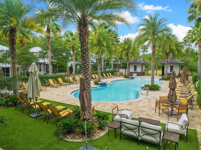 view of swimming pool with a gazebo and a patio